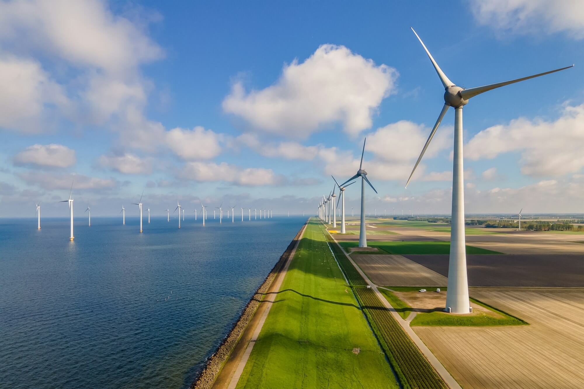 windmill turbines at sea generate green energy in the netherlands